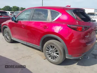 2017 Mazda CX-5 Touring with VIN JM3KFACL3H0195212, listed as a IAAI auction lot 42041361 with 57,377 mi miles and . Bid and sale history available at carsss.com. Image 3.