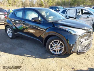 2021 Toyota C-HR LE with VIN NMTKHMBXXMR123633, listed as a IAAI auction lot 40787336 with 28,234 mi miles. Bid and sale history available at carsss.com. Image 1.