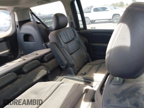 2005 Honda Odyssey TOURING with VIN 5FNRL38895B060605, listed as a IAAI auction lot 41809330 with 228,487 mi miles. Bid and sale history available at carsss.com. Image 8.