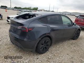2024 Tesla Model Y with VIN 7SAYGDEDXRA322676, listed as a Copart auction lot 55664125 with 8,788 mi miles and Clean title. Bid and sale history available at DreamBid. Image 3.