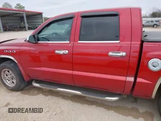2006 Dodge Dakota SLT with VIN 1D7HE48K26S511004, listed as a IAAI auction lot 41344188 with 208,273 mi miles and . Bid and sale history available at DreamBid. Image 14.