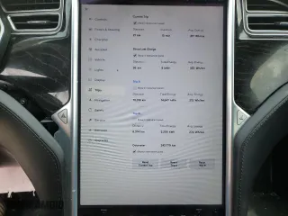 2017 Tesla Model S 100D with VIN 5YJSA1E24HF186757, listed as a Copart auction lot 51511745 with 242,779 mi miles and Salvage Title. Bid and sale history available at carsss.com. Image 9.