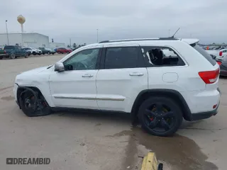 2013 Jeep Grand Cherokee Limited with VIN 1C4RJFBT3DC545662, listed as a IAAI auction lot 41576431 with 153,142 mi miles. Bid and sale history available at carsss.com. Image 14.