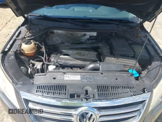 2011 Volkswagen Tiguan SEL z VIN WVGBV7AX5BW512203, wystawiony jako IAAI lot #42273838 z przebiegiem 157 072 mil mil oraz . Historia ofert i sprzedaży dostępna na DreamBid. Obrazek 10.