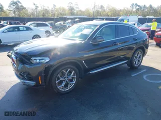 2020 BMW X4 xDrive30i with VIN 5UX2V1C07L9B83698, listed as a IAAI auction lot 41860487 with 51,891 mi miles. Bid and sale history available at carsss.com. Image 2.