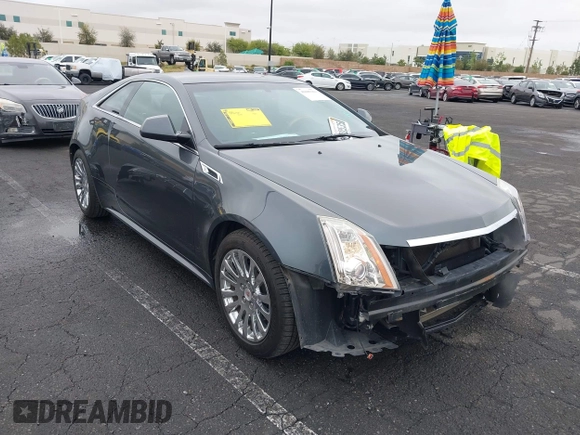 2011 Cadillac CTS Performance with VIN 1G6DJ1ED7B0126314, listed as a IAAI auction lot 42185363 with 80,676 mi miles and . Bid and sale history available at DreamBid. Image 1.