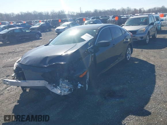 2018 Honda Civic LX with VIN 19XFC2F58JE042456, listed as a IAAI auction lot 41823195 with 45,291 mi miles and . Bid and sale history available at DreamBid. Image 18.