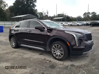 2020 Cadillac XT4 FWD Premium Luxury with VIN 1GYFZCR42LF149030, listed as a Copart auction lot 82671894 with 88,570 mi miles and Salvage Title. Bid and sale history available at carsss.com. Image 4.