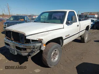2001 Dodge 2500 with VIN 3B7KF26601M284792, listed as a Copart auction lot 54243835 with 143,804 mi miles and Salvage title. Bid and sale history available at DreamBid. Image 1.