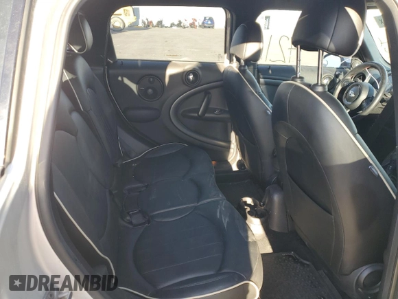 2015 MINI Countryman John Cooper Works with VIN WMWXD1C53FWS34815, listed as a Copart auction lot 74667224 with 94,971 mi miles and Salvage Title. Bid and sale history available at DreamBid. Image 10.