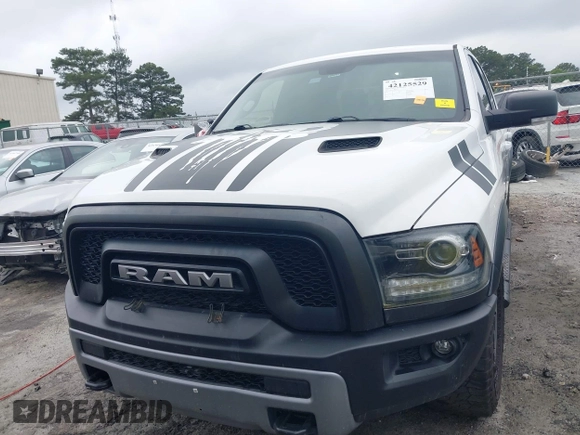 2017 Ram 1500 Rebel with VIN 1C6RR7YT7HS575529, listed as a IAAI auction lot 42125529 with 110,722 mi miles and . Bid and sale history available at DreamBid. Image 12.
