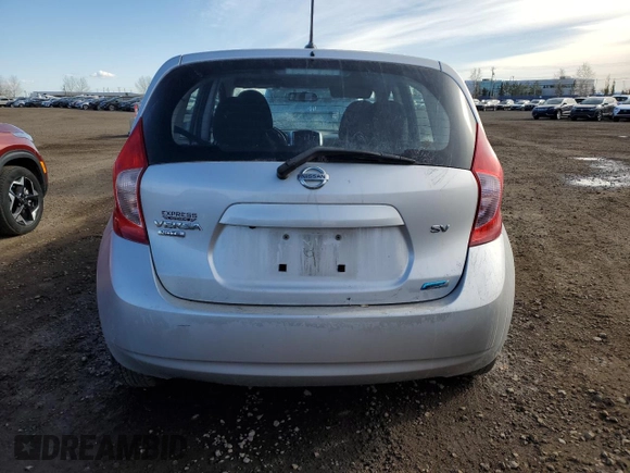 2015 Nissan Note SV z VIN 3N1CE2CP6FL360018, wystawiony jako Copart lot #77185904 z przebiegiem 157 196 mil mil oraz Szkoda całkowita • Salvage title. Historia ofert i sprzedaży dostępna na DreamBid. Obrazek 6.