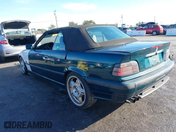1997 BMW 3-Series 328IC with VIN WBABK8323VET99072, listed as a IAAI auction lot 40669447 with 135,584 mi miles. Bid and sale history available at carsss.com. Image 3.
