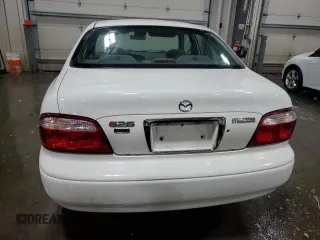 2001 Mazda 626 LX with VIN 1YVGF22C515228204, listed as a Copart auction lot 44416185 with 127,230 mi miles and Salvage Title. Bid and sale history available at carsss.com. Image 6.