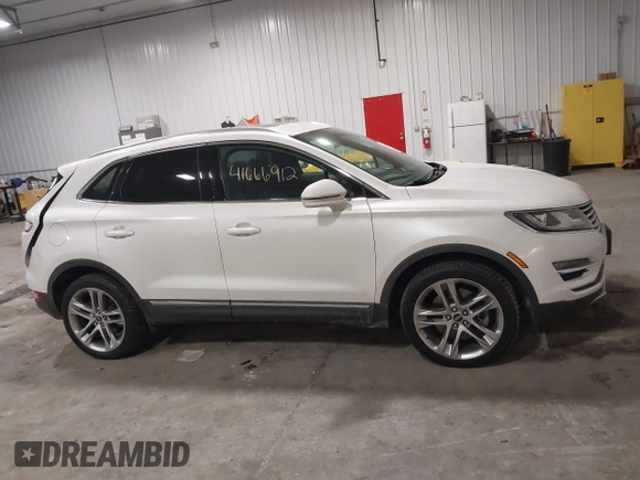 2016 Lincoln MKC Reserve with VIN 5LMTJ3DH2GUJ24052, listed as a IAAI auction lot 41666912 with 62,818 mi miles and . Bid and sale history available at DreamBid. Image 13.