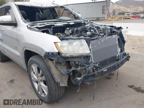 2011 Jeep Grand Cherokee Laredo with VIN 1J4RS4GG1BC646719, listed as a IAAI auction lot 42056300 with Not Provided miles and . Bid and sale history available at DreamBid. Image 14.