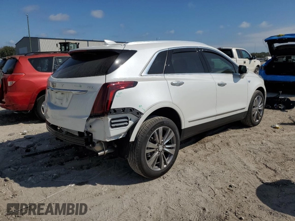2023 Cadillac XT5 FWD Premium Luxury with VIN 1GYKNCRS9PZ224013, listed as a Copart auction lot 44164135 with 12,003 mi miles and Salvage Title. Bid and sale history available at carsss.com. Image 3.