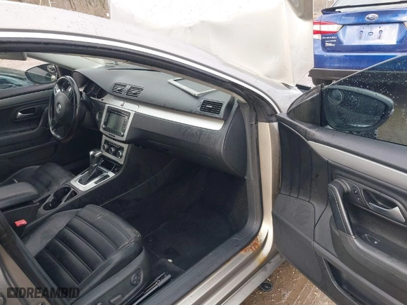 2010 Volkswagen CC Sport with VIN WVWML7AN9AE512324, listed as a IAAI auction lot 41195198 with 243,500 mi miles. Bid and sale history available at carsss.com. Image 5.