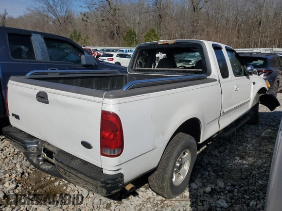 2000 Ford F-150 XL with VIN 1FTZX1727YNB23518, listed as a Copart auction lot 43914215 with 0 mi miles and Salvage Title. Bid and sale history available at carsss.com. Image 3.
