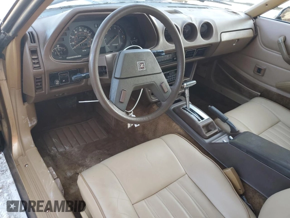 1980 Datsun 280ZX z VIN HS130221335, wystawiony jako Copart lot #81964444 z przebiegiem 135 266 mil mil oraz Szkody całkowita. Historia ofert i sprzedaży dostępna na DreamBid. Obrazek 8.