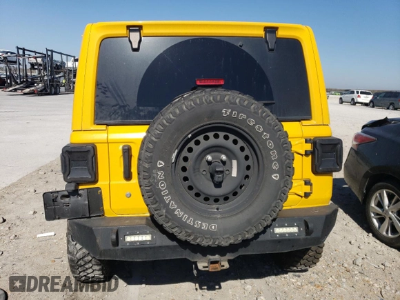 2019 Jeep Wrangler Unlimited Sahara with VIN 1C4HJXEN9KW507069, listed as a Copart auction lot 48542065 with 143,457 mi miles and Salvage title. Bid and sale history available at DreamBid. Image 6.