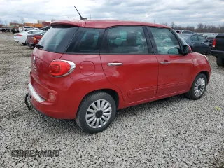 2014 FIAT 500L Easy with VIN ZFBCFABH7EZ002869, listed as a Copart auction lot 50063045 with 100,438 mi miles and Salvage Title. Bid and sale history available at DreamBid. Image 3.