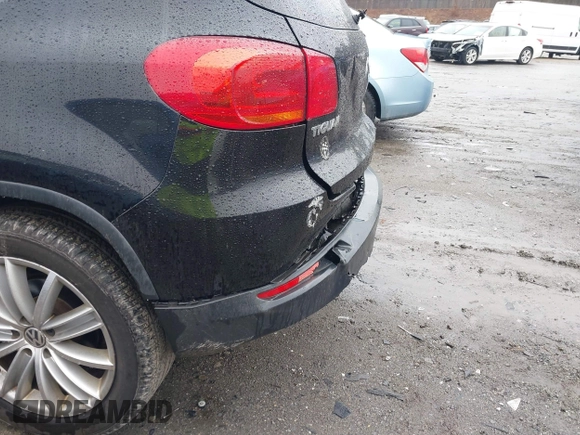 2012 Volkswagen Tiguan SEL with VIN WVGAV7AX2CW529232, listed as a IAAI auction lot 41955121 with 164,885 mi miles and . Bid and sale history available at DreamBid. Image 6.
