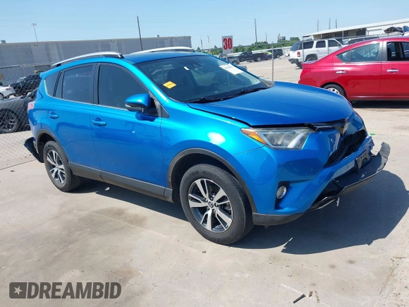 2018 Toyota RAV4 XLE with VIN JTMWFREV2JJ168557, listed as a IAAI auction lot 41994837 with 107,636 mi miles. Bid and sale history available at carsss.com. Image 1.
