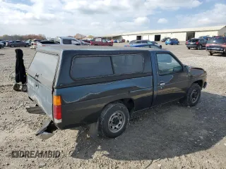 1994 Nissan Frontier with VIN 1N6SD11S4RC405080, listed as a Copart auction lot 82565904 with 154,400 mi miles and Salvage title. Bid and sale history available at DreamBid. Image 3.