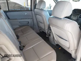 2013 Honda Pilot Touring with VIN 5FNYF4H95DB079782, listed as a IAAI auction lot 42737391 with 152,830 mi miles and . Bid and sale history available at DreamBid. Image 8.