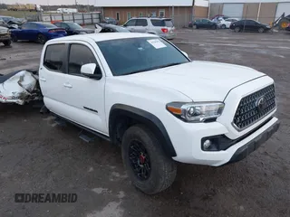 2019 Toyota Tacoma SR z VIN 3TMCZ5AN2KM239429, wystawiony jako IAAI lot #41928283 z przebiegiem 70 298 mil mil oraz . Historia ofert i sprzedaży dostępna na DreamBid. Obrazek 1.