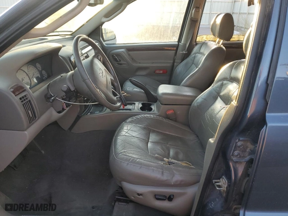 2003 Jeep Grand Cherokee Limited with VIN 1J4GW58N03C561385, listed as a Copart auction lot 75777094 with 169,705 mi miles and Salvage Title. Bid and sale history available at carsss.com. Image 7.