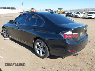 2012 BMW 3 Series 328i with VIN WBA3A5C58CF343636, listed as a IAAI auction lot 41832374 with 136,968 mi miles. Bid and sale history available at carsss.com. Image 3.
