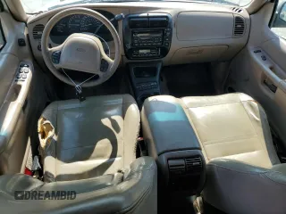 2000 Ford Explorer Eddie Bauer с VIN 1FMDU84P2YZB86557, выставлен на аукционе Copart как лот 59590365 с пробегом 140 872 миль миль и Списание • Salvage title. История ставок и продаж доступна на DreamBid. Изображение 8.