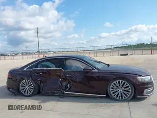 2019 Audi A8 z VIN WAU8DAF85KN004784, wystawiony jako IAAI lot #42414695 z przebiegiem Nie podano mil oraz . Historia ofert i sprzedaży dostępna na DreamBid. Obrazek 12.