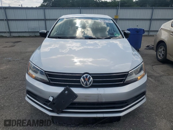 2015 Volkswagen Jetta SE z VIN 3VWD17AJ4FM417218, wystawiony jako Copart lot #61001125 z przebiegiem 84 159 mil mil oraz Szkoda całkowita • Salvage title. Historia ofert i sprzedaży dostępna na DreamBid. Obrazek 5.