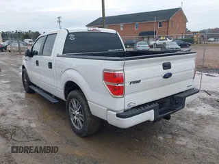 2014 Ford F-150 XL with VIN 1FTFW1CF8EFA66332, listed as a IAAI auction lot 41033667 with 200,513 mi miles. Bid and sale history available at carsss.com. Image 3.