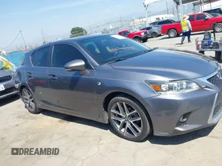 2014 Lexus CT 200h z VIN JTHKD5BH7E2195361, wystawiony jako IAAI lot #41992404 z przebiegiem 210 313 mil mil oraz . Historia ofert i sprzedaży dostępna na DreamBid. Obrazek 14.