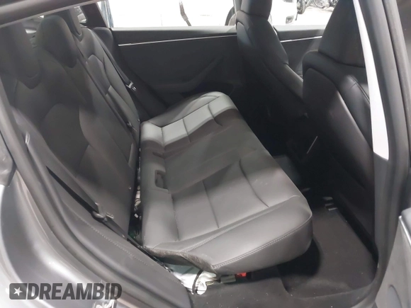 2024 Tesla Model 3 Long Range with VIN 5YJ3E1EB0RF860736, listed as a IAAI auction lot 41966827 with 5,134 mi miles and . Bid and sale history available at DreamBid. Image 8.