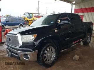 2012 Toyota Tundra 4WD Truck with VIN 5TFDW5F1XCX253223, listed as a IAAI auction lot 41453842 with 163,730 mi miles. Bid and sale history available at carsss.com. Image 2.