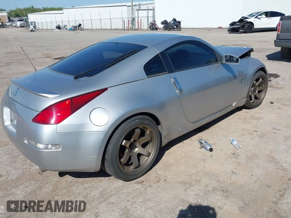 2003 Nissan 350Z Touring with VIN JN1AZ34E93T011392, listed as a IAAI auction lot 42096385 with 83,429 mi miles and . Bid and sale history available at DreamBid. Image 4.