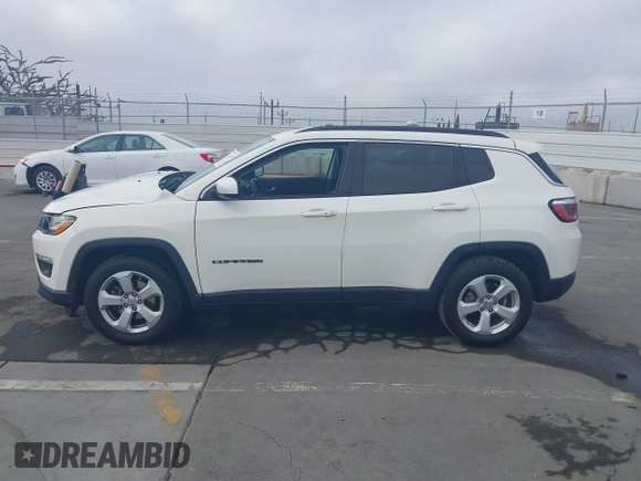2019 Jeep Compass Altitude z VIN 3C4NJCBB6KT809494, wystawiony jako IAAI lot #42398252 z przebiegiem 62 813 mil mil oraz . Historia ofert i sprzedaży dostępna na DreamBid. Obrazek 14.