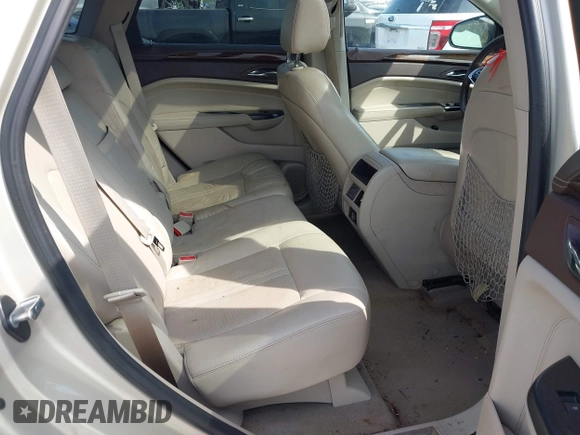 2013 Cadillac SRX Luxury Collection with VIN 3GYFNCE3XDS632366, listed as a IAAI auction lot 42231784 with 85,591 mi miles and . Bid and sale history available at DreamBid. Image 8.