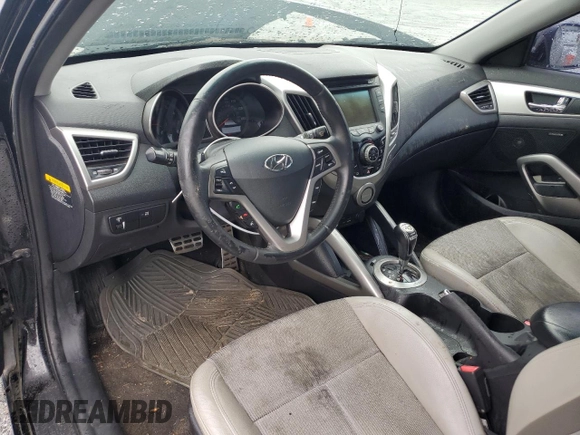 2013 Hyundai Veloster w/Gray Int с VIN KMHTC6AD8DU113990, выставлен на аукционе Copart как лот 54571895 с пробегом 181 757 миль миль и Списание • Salvage title. История ставок и продаж доступна на DreamBid. Изображение 8.