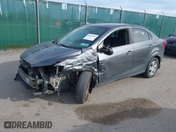 2012 Chevrolet Sonic LT with VIN 1G1JC5SH5C4167049, listed as a IAAI auction lot 42124461 with 134,864 mi miles and . Bid and sale history available at DreamBid. Image 2.