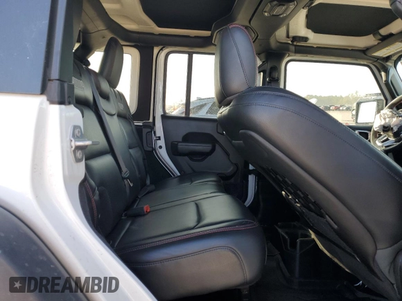 2022 Jeep Wrangler Unlimited Rubicon с VIN 1C4HJXFN3NW193177, выставлен на аукционе Copart как лот 82002224 с пробегом 34 762 миль миль и Списание • Salvage title. История ставок и продаж доступна на DreamBid. Изображение 11.