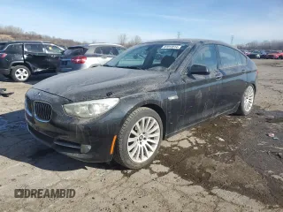 2011 BMW 5 Series GT 535i with VIN WBASN2C56BC201347, listed as a Copart auction lot 87013514 with 126,647 mi miles and Salvage Title. Bid and sale history available at carsss.com. Image 1.