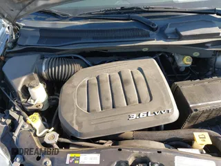 2013 Dodge Grand Caravan SXT with VIN 2C4RDGCG3DR553217, listed as a IAAI auction lot 41898964 with 101,989 mi miles and . Bid and sale history available at DreamBid. Image 10.