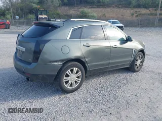 2013 Cadillac SRX Luxury Collection with VIN 3GYFNCE31DS587415, listed as a IAAI auction lot 42020500 with 279,638 mi miles and . Bid and sale history available at DreamBid. Image 4.