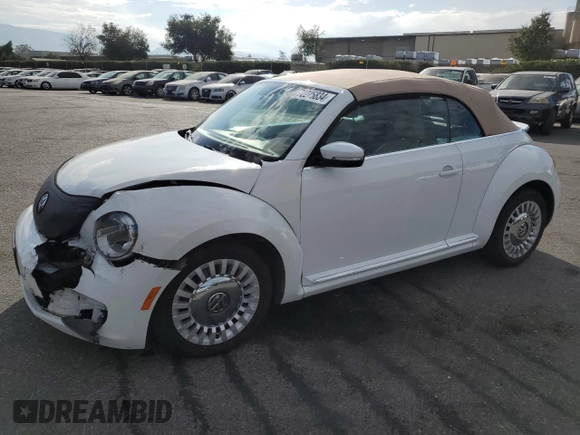 2015 Volkswagen Beetle 1.8T with VIN 3VW517AT6FM802771, listed as a Copart auction lot 72225834 with 128,946 mi miles and Salvage title. Bid and sale history available at DreamBid. Image 1.